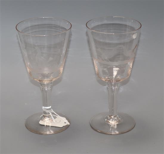 A pair of large etched wine glasses 20cm high